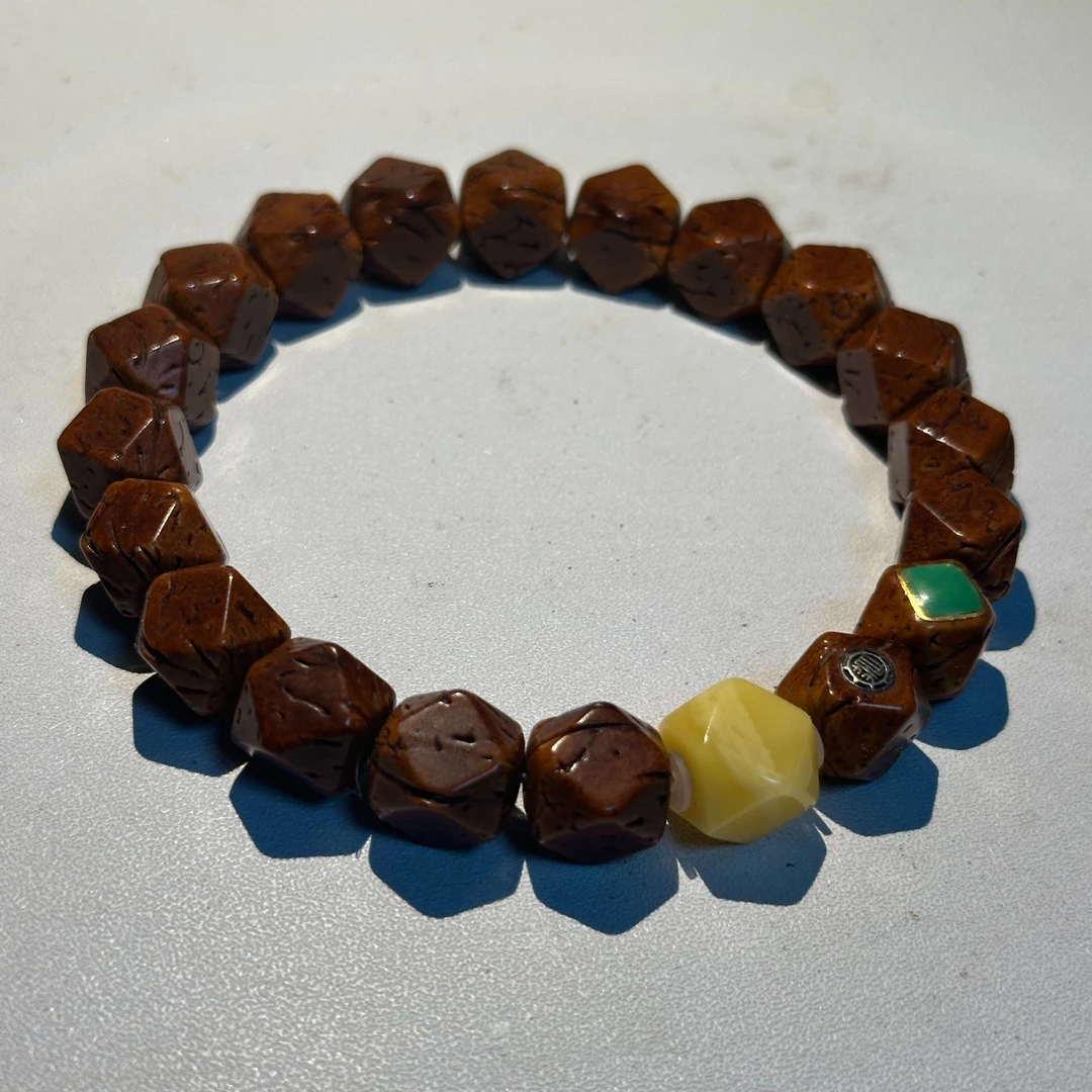 文玩桃核唐八棱单圈手串