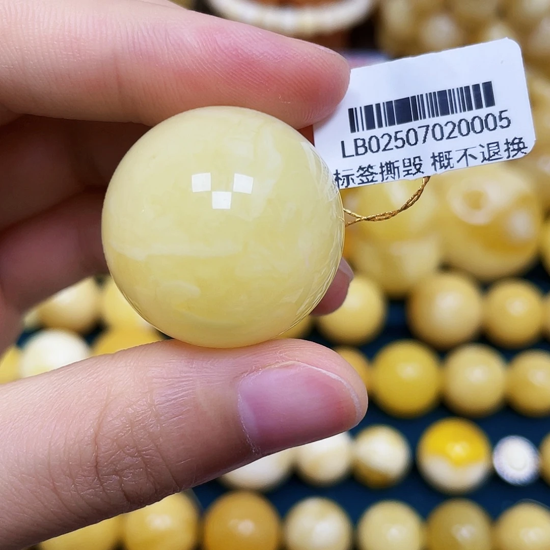 琥珀未镶嵌裸石24.7mm.瑕