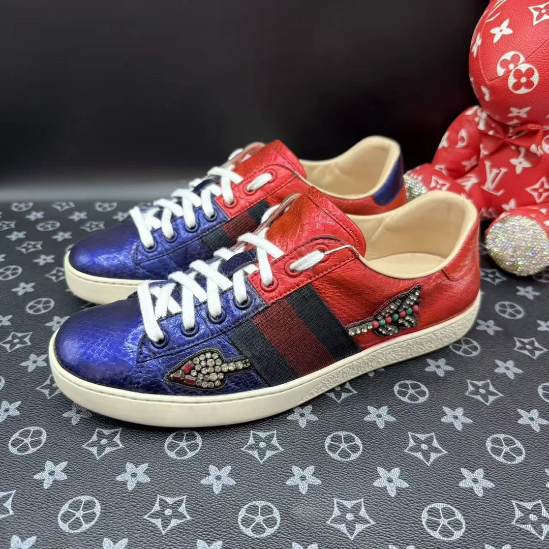 95新 GUCCI/古驰 男士时尚红紫色一箭穿心休闲板鞋38.5码ddm2975