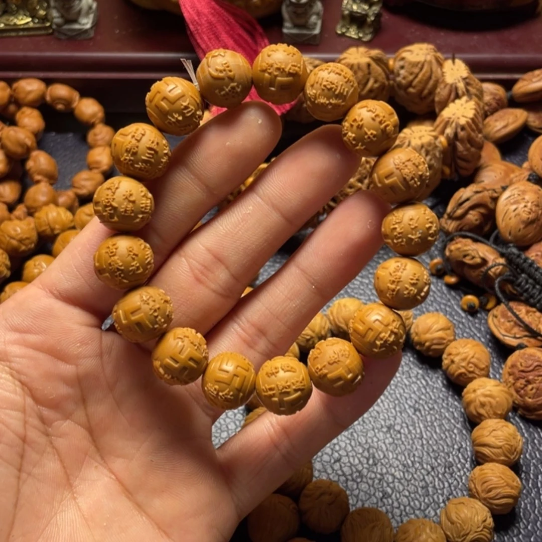 匠***伟猴头核桃雕刻心经
