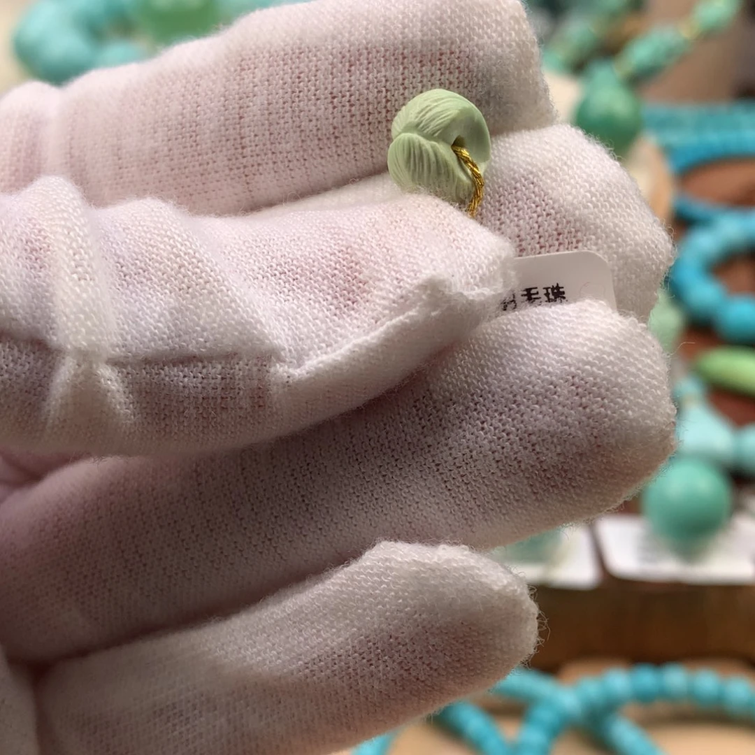 绿松石未镶嵌珠宝奇石菜籽黄羽毛珠9.2*5.9mm