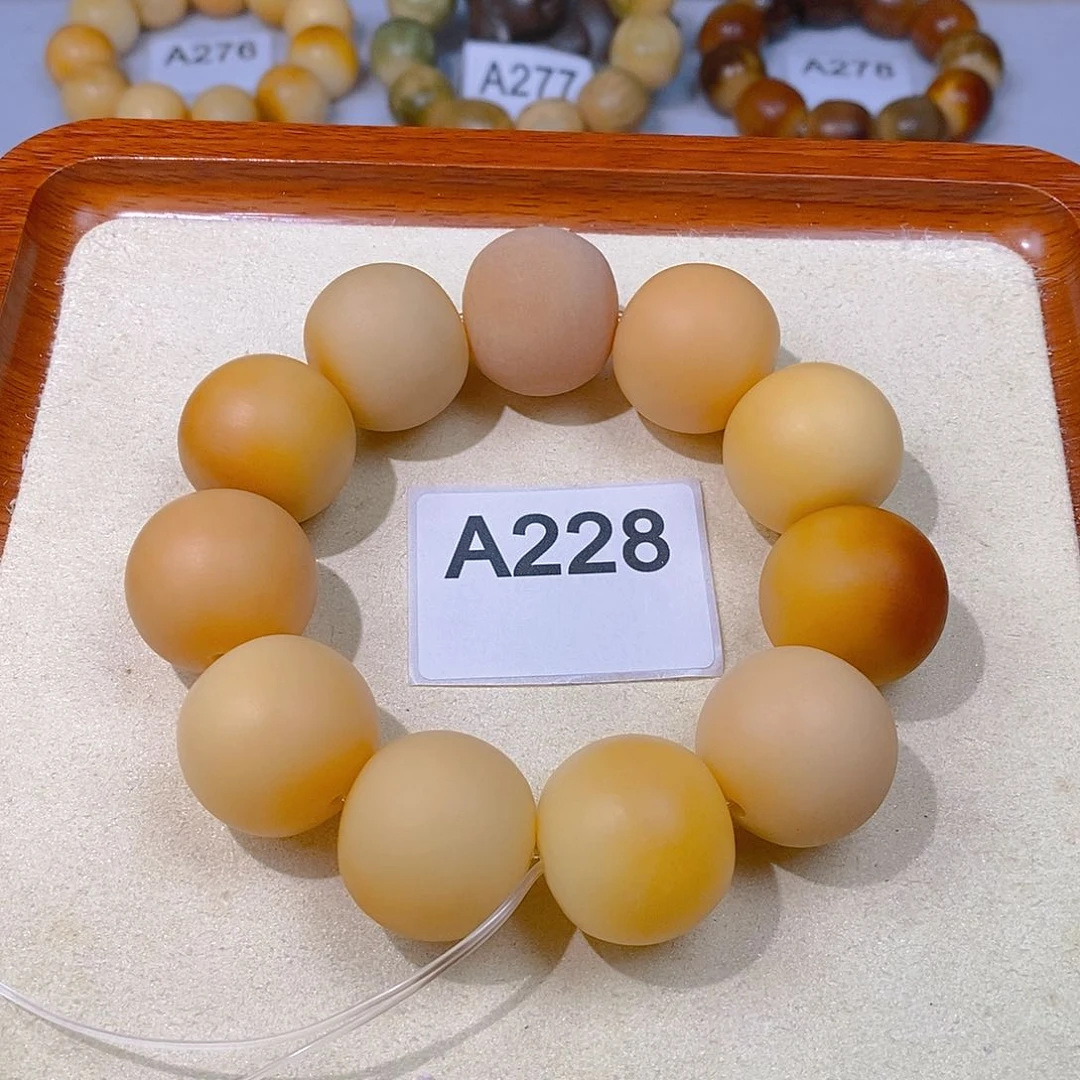 菩提根/象牙果手串干磨苹果珠24mm（微瑕）