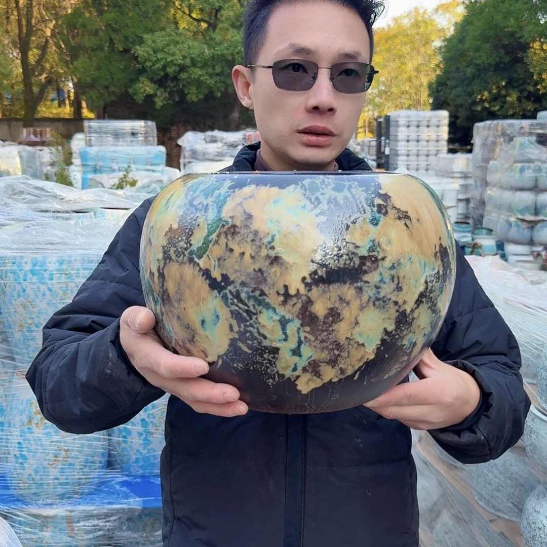 紫砂花盆口21高23（一个胖子黑色姹寂