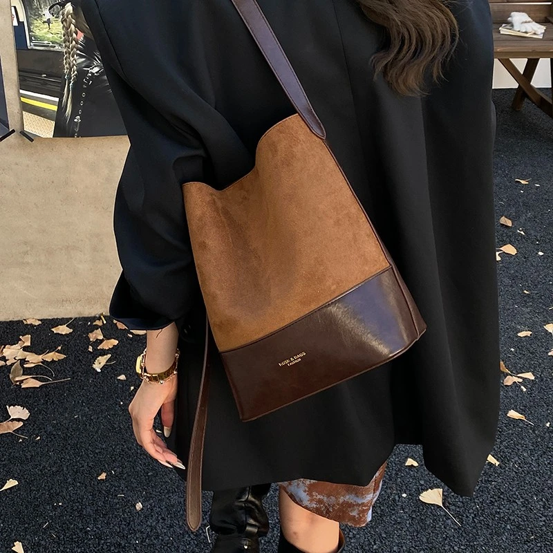 【许我耀眼】磨砂做旧水桶包简约风磁扣单肩包耐磨文艺风防脏韩式