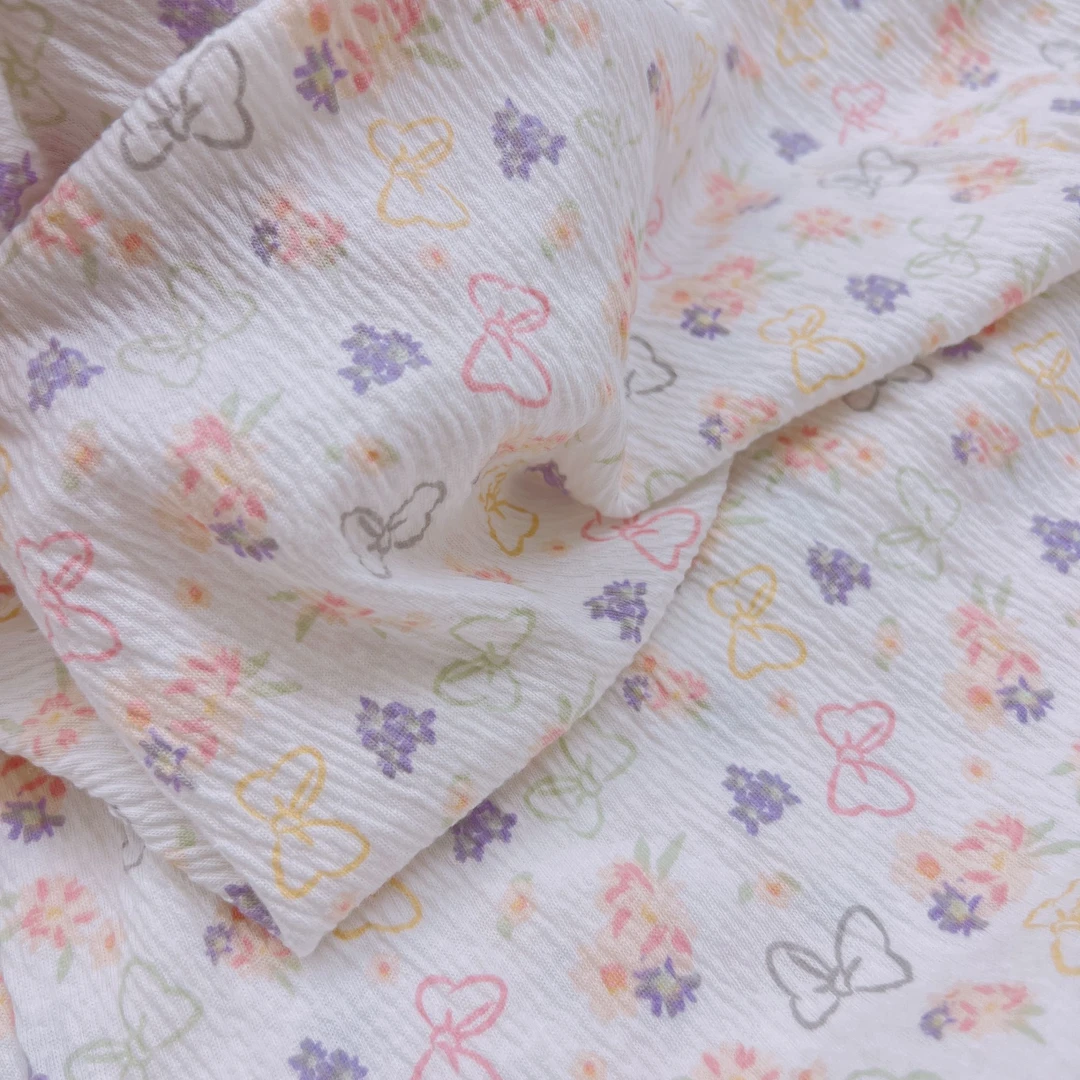 T432夏季轻薄透气纯棉蝴蝶结碎花皱皱弹力针织面料2米价【宽1.15】