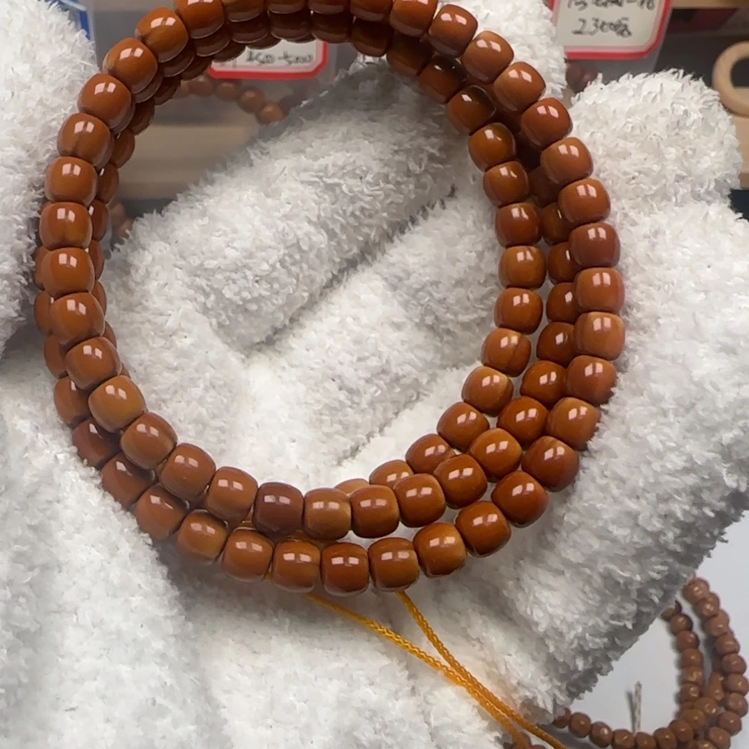 恶***父橄榄核手串老挝长串极限弧福利6.2mm