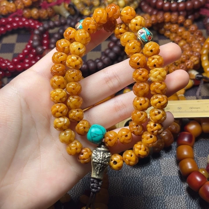 凤眼菩提吊坠藏区牛牛材质手持