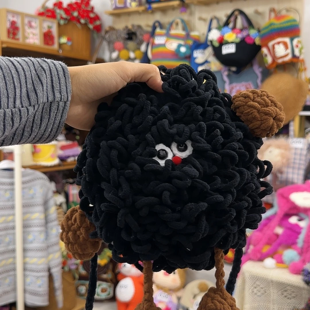棉黑色煤球手机包