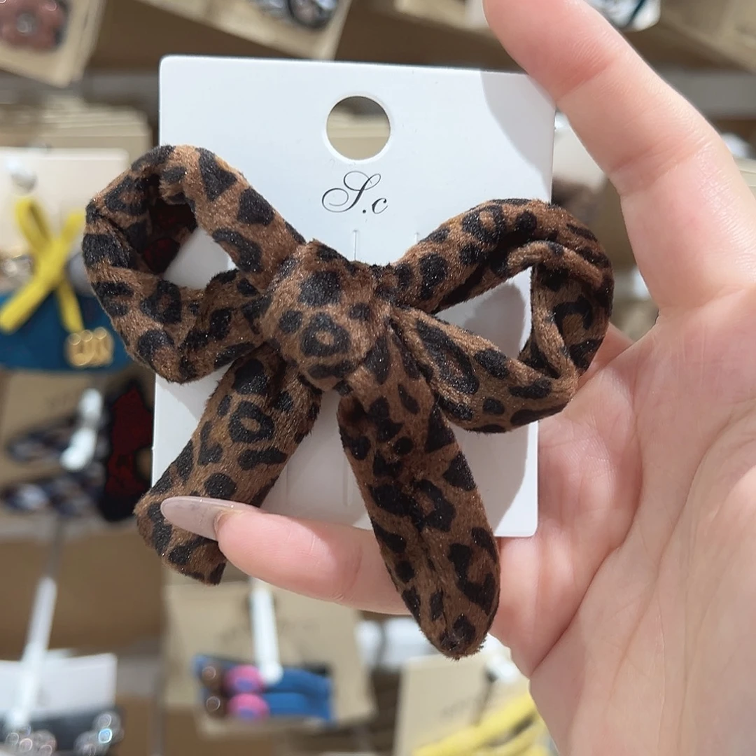 非金属仿珍珠豹纹蝴蝶结鸭夹