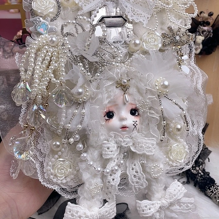 铜合金手作娃头手机包