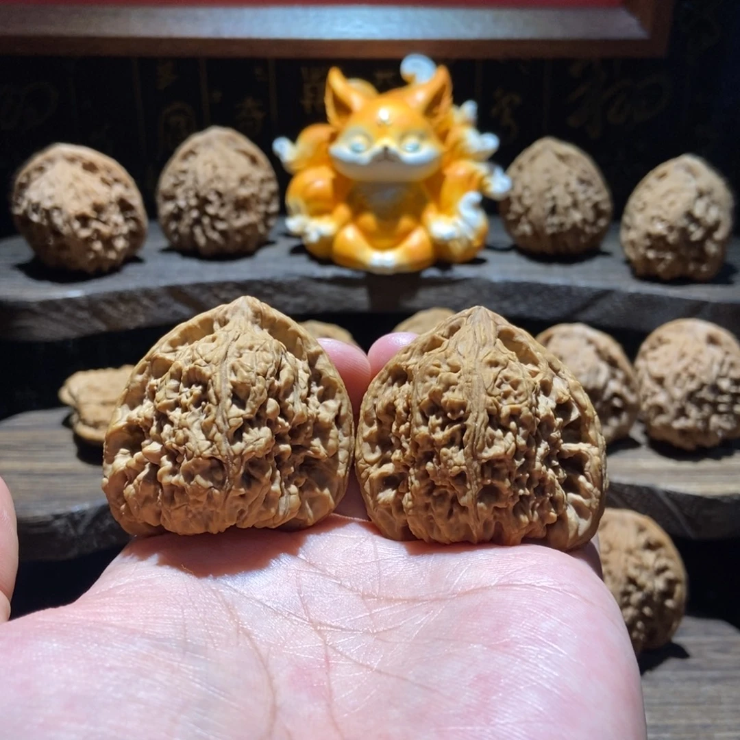 羽***人文玩核桃把件涿鹿南将石