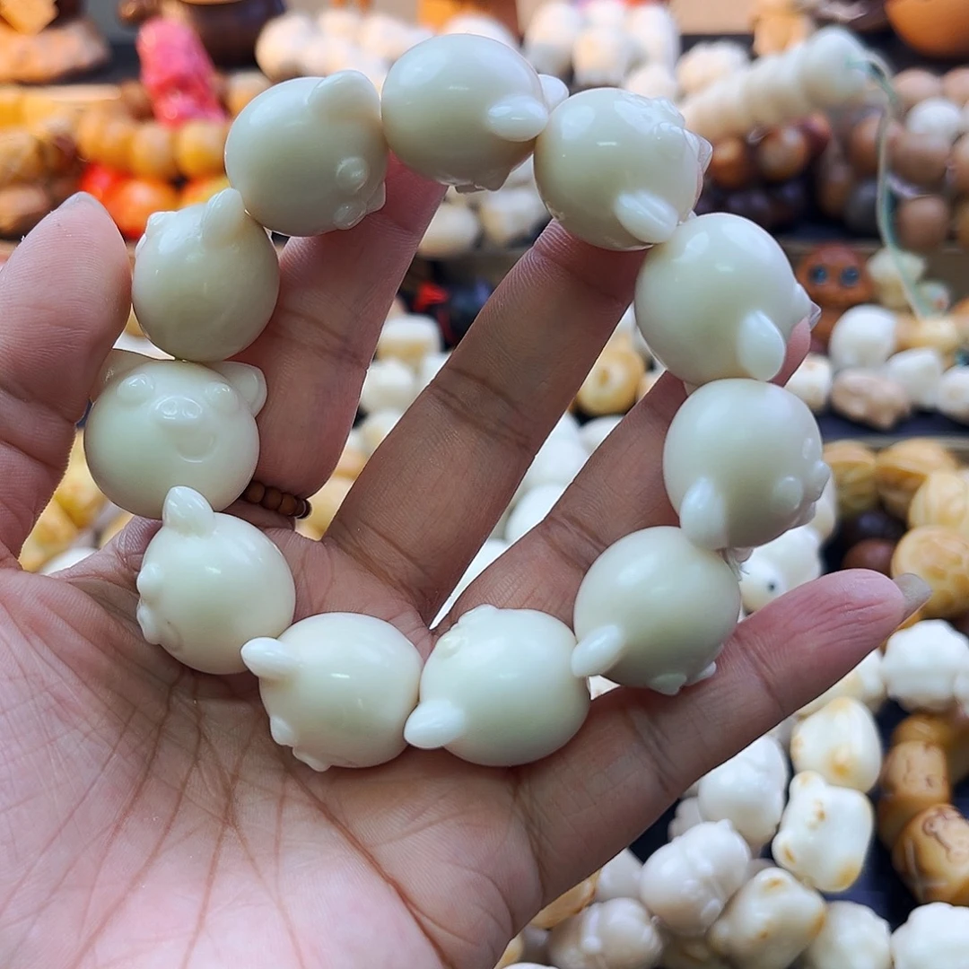 菩提根/象牙果手串猪猪八折
