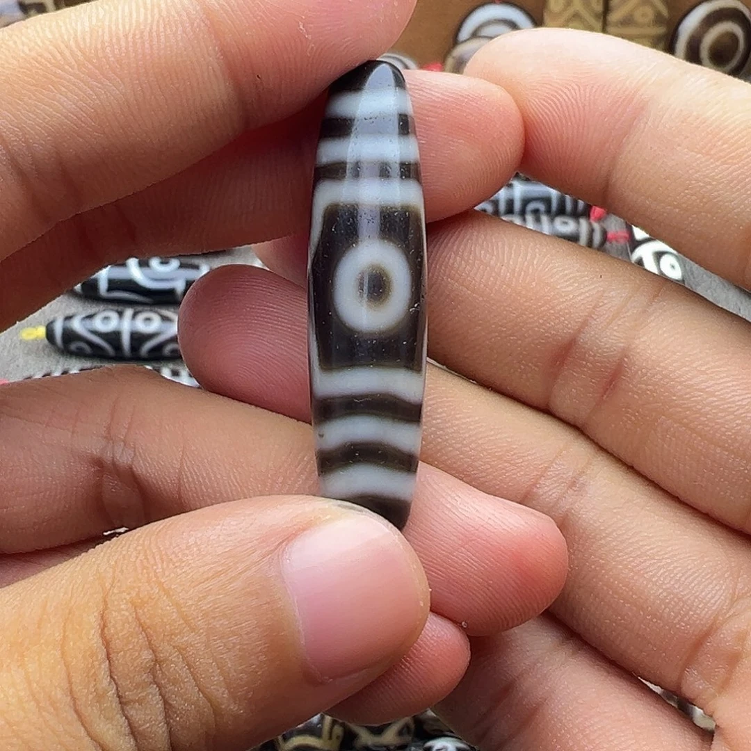 玛瑙/玉髓未镶嵌吊坠(赠链)曲贡宝盖三眼天珠