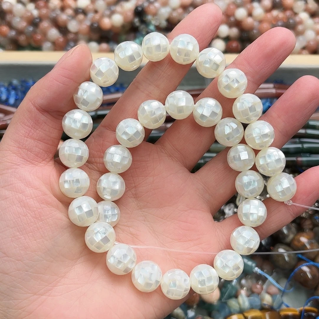 Y****玛瑙/玉髓未镶嵌珠宝半成品螺圆珠一条