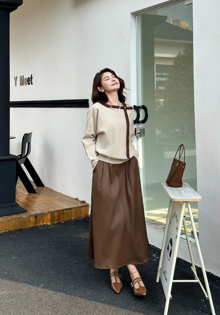 9336#2025新款时尚露肩设计毛衣气质半身裙两件套套装