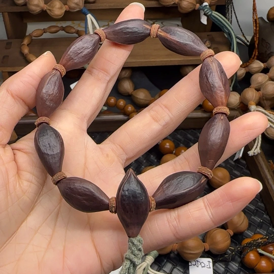 手串橄榄核25。1.3紫皮