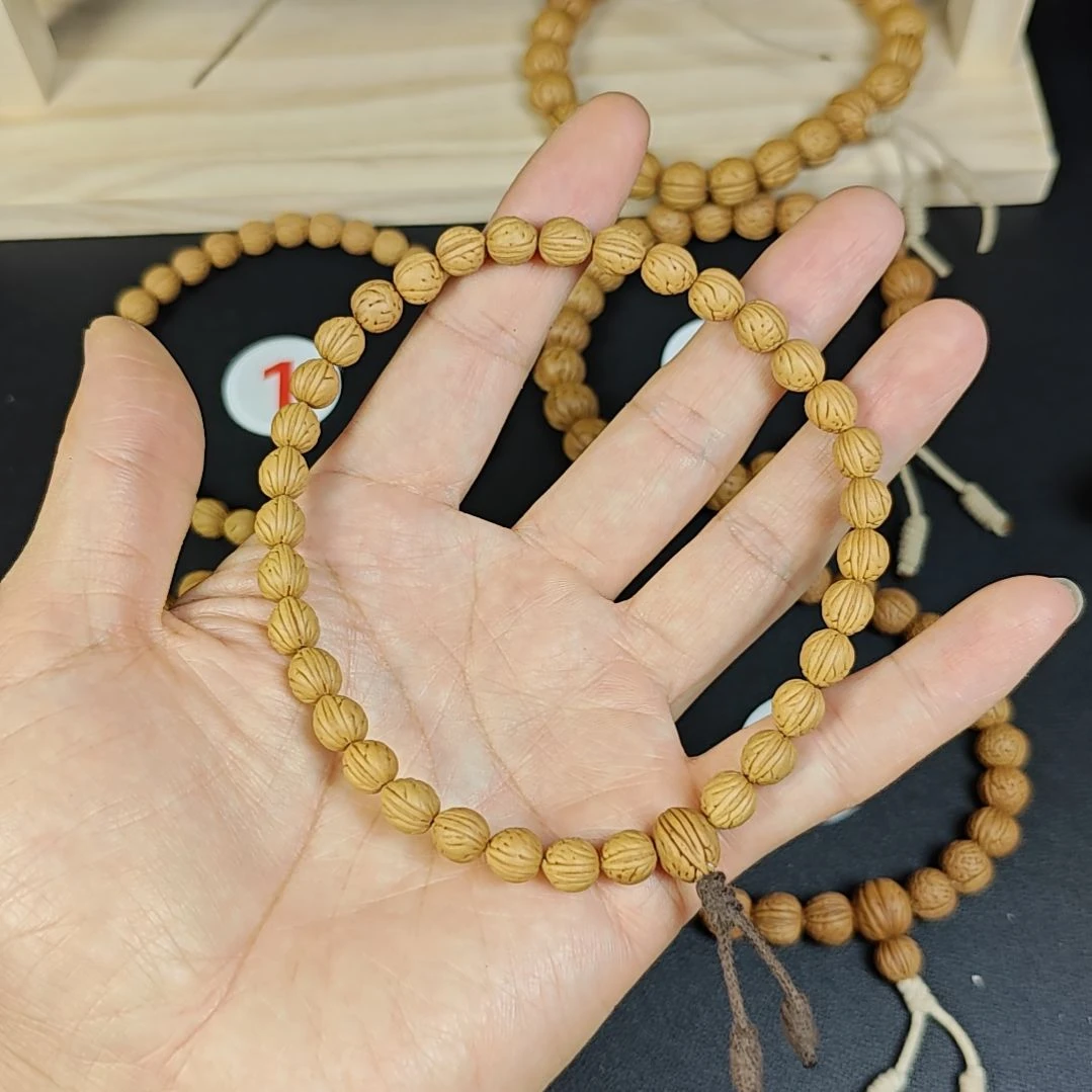 小***儿8+桃核手持瓜子型