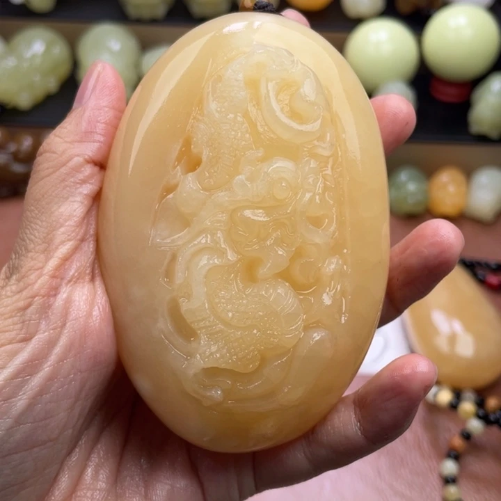 珂***珂石材天然古青石手把件