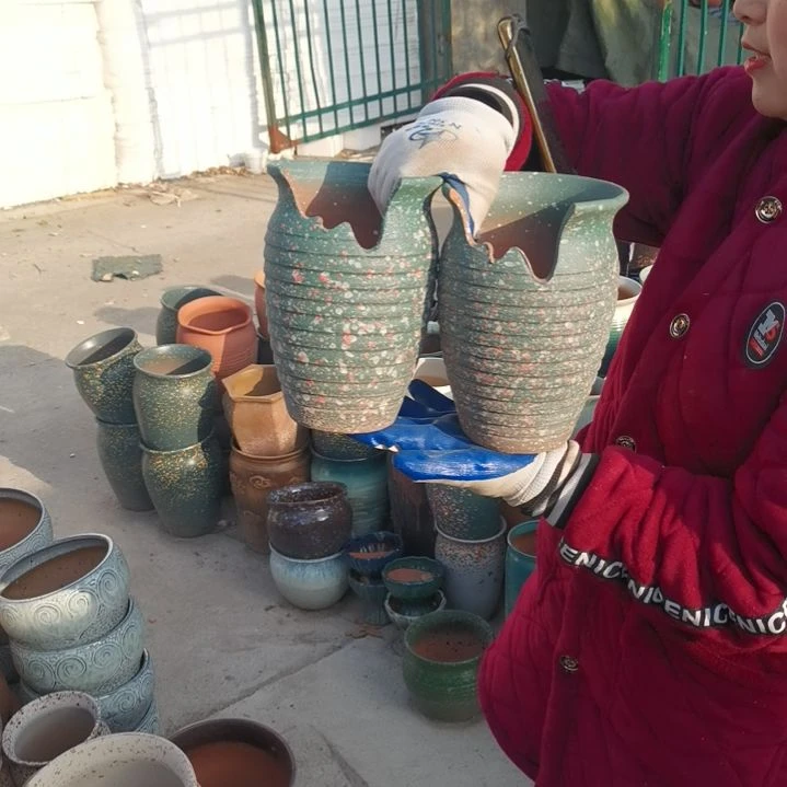 红陶口14高21瑕疵两盆