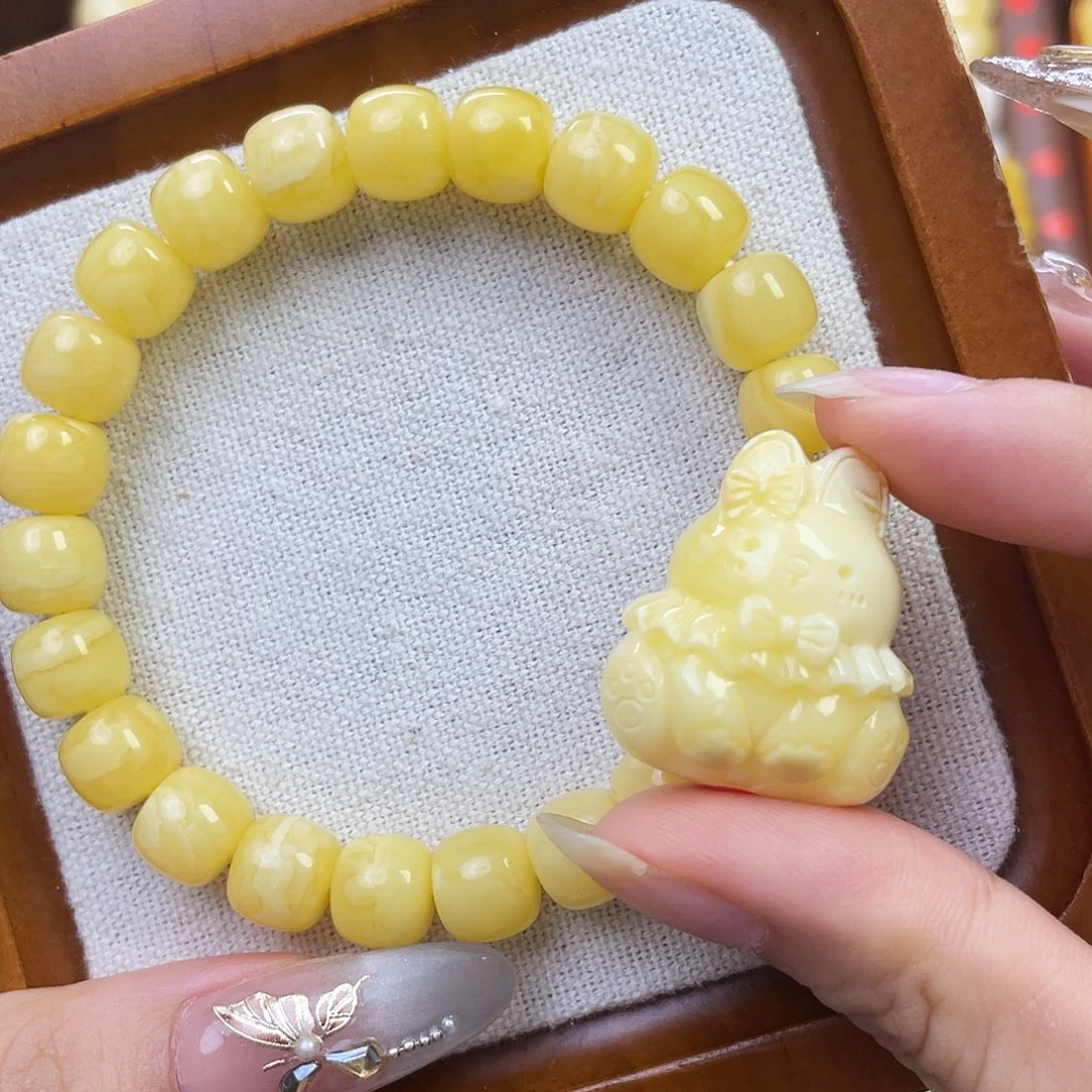 欣***～裸石琥珀未镶嵌兔子手串