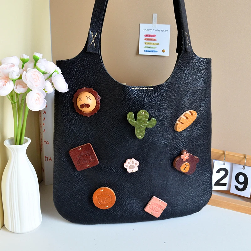 【熊花花】大容量黑色腋下托特包治愈系单肩背心包真皮通勤女包包