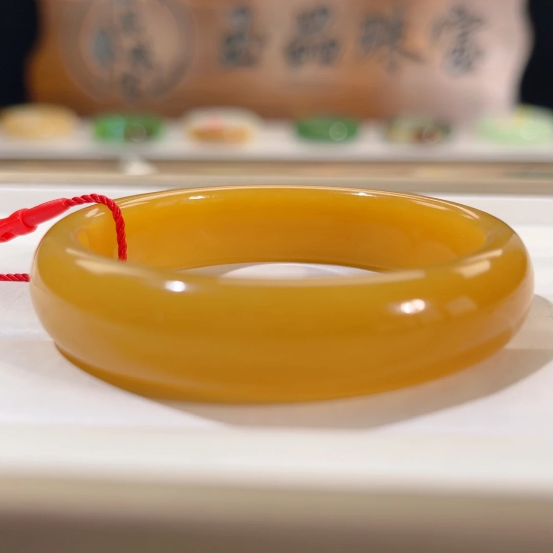 和田玉未镶嵌手镯    「且末金橘蜜糖」