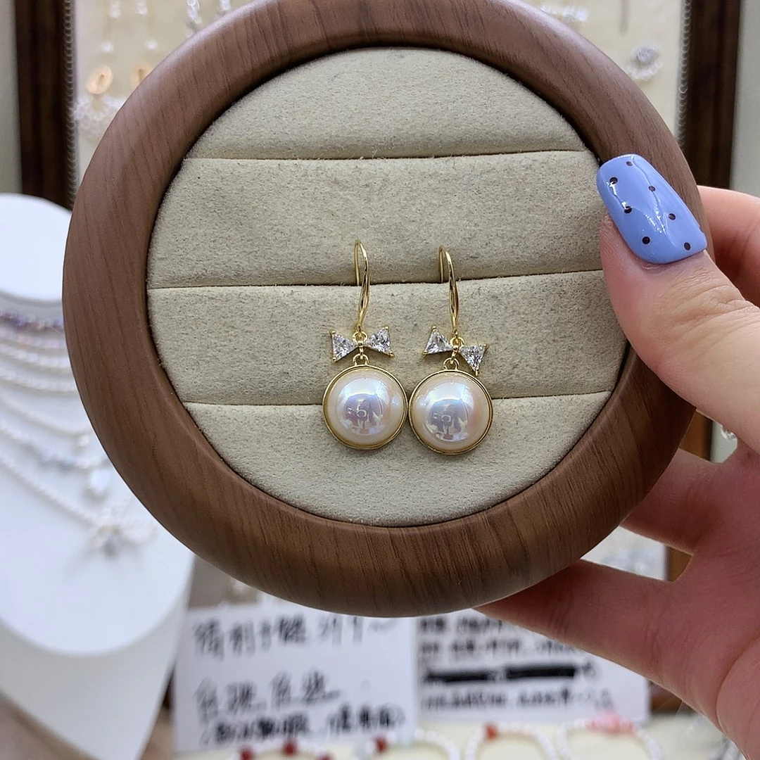 淡水珍珠银S925镶嵌耳饰