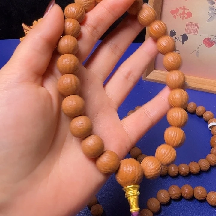 夜***人手串猴头核桃聚宝盆