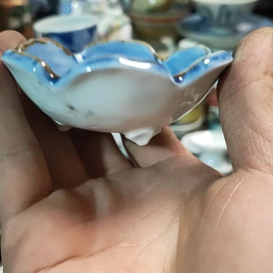 悠****茶盏瓷器活动的人