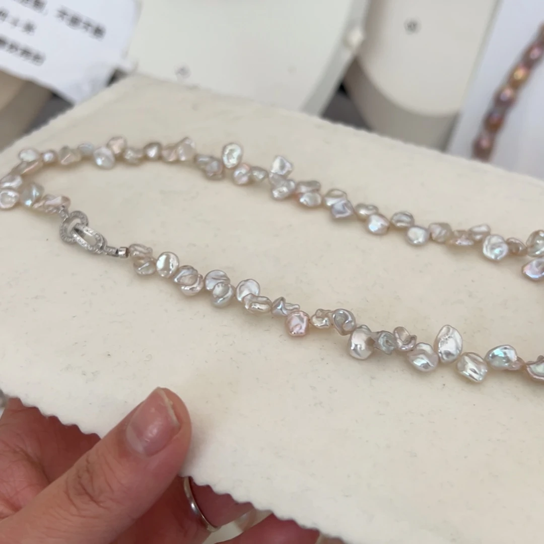 淡水珍珠耳环银S925镶嵌蝴蝶结