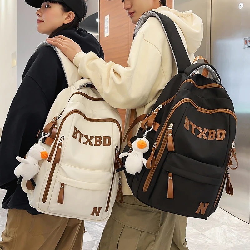 书包男女初中生韩版高中大学生百搭双肩包轻便减负大容量电脑背包