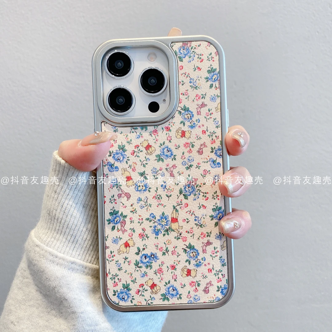 适用于苹果16新华为vivo小米oppo银框皮革卡通手机壳碎花维尼