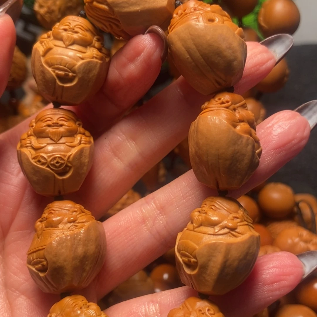 橄榄核吊坠包衣财神