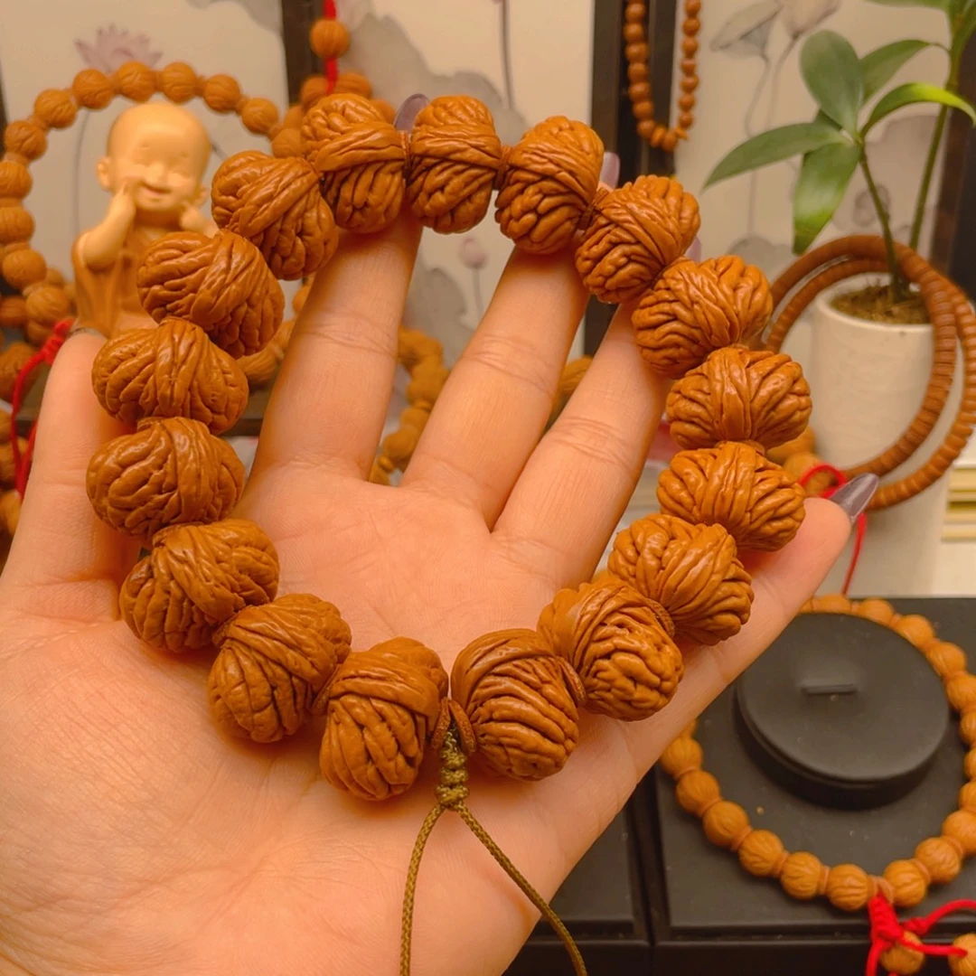 杨***涛手串桃核红红火火。红红火火