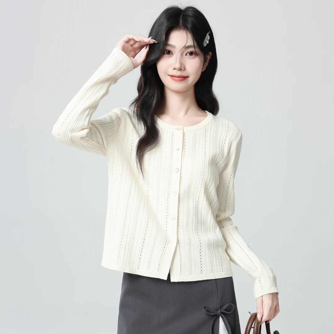 杏色圆领针织开衫女春秋2025秋季新款设计感薄款镂空长袖短款上衣