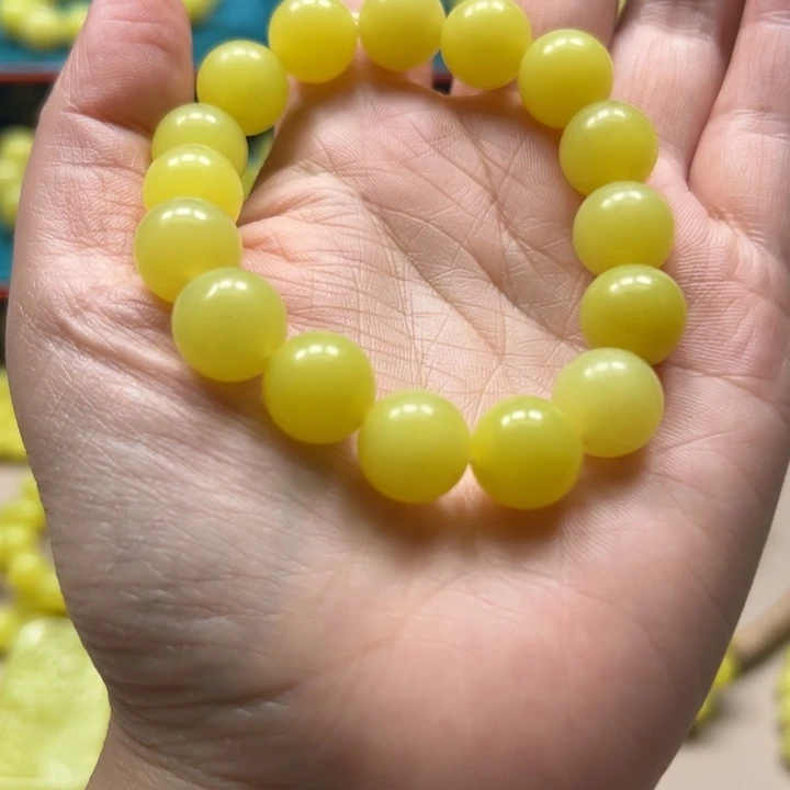 子***辰非金属新疆若羌黄口手串