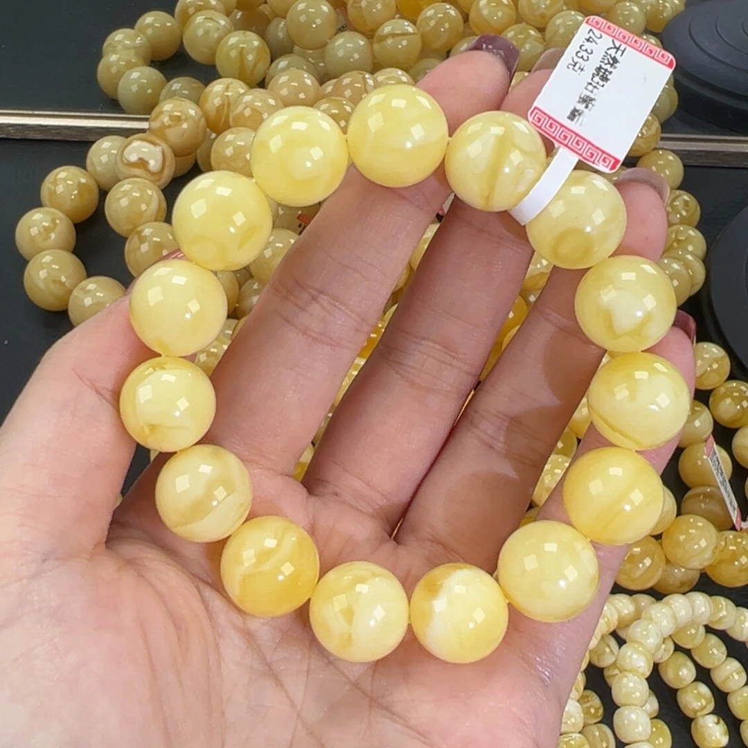 琥珀未镶嵌手链24.4黄白妖花