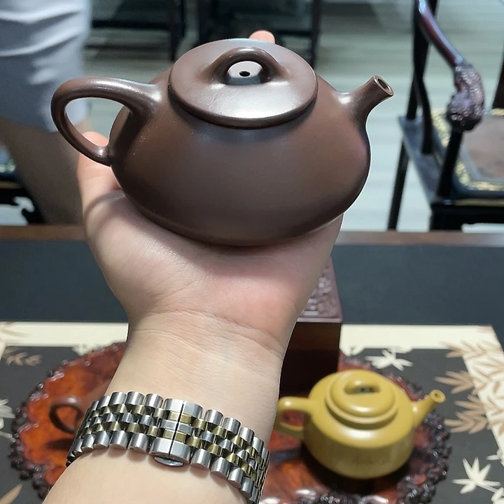 建***A紫砂茶壶在一起了