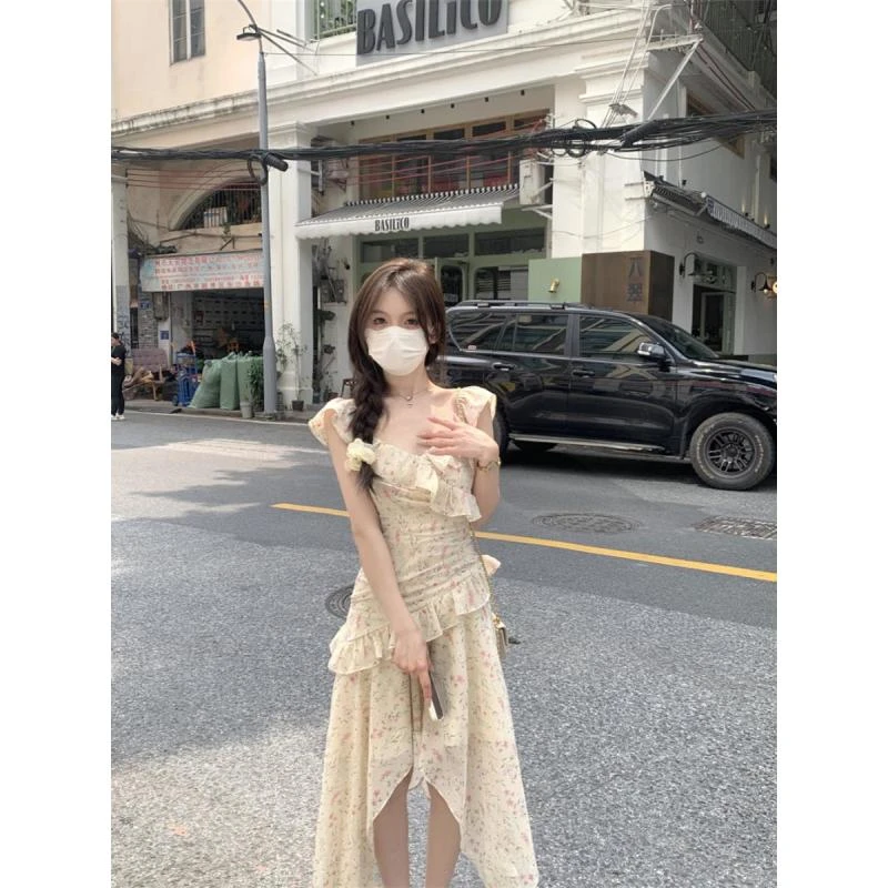 法式茶歇不规则荷叶边吊带碎花连衣裙女夏季新款海边度假风长裙子