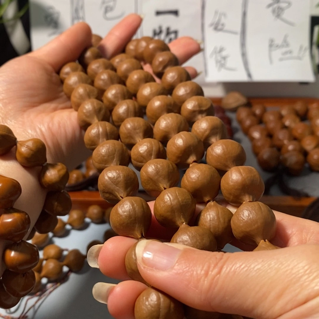 橄榄核手串刚*9161精品蒜头铁核鸡血红54+2颗