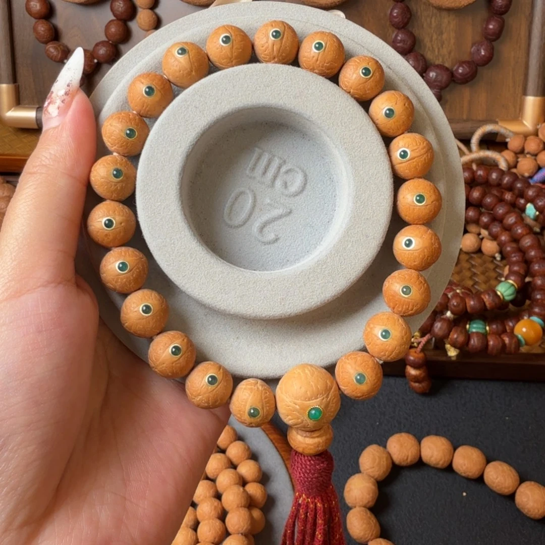 凤眼菩提把件12mm/镶嵌绿玛