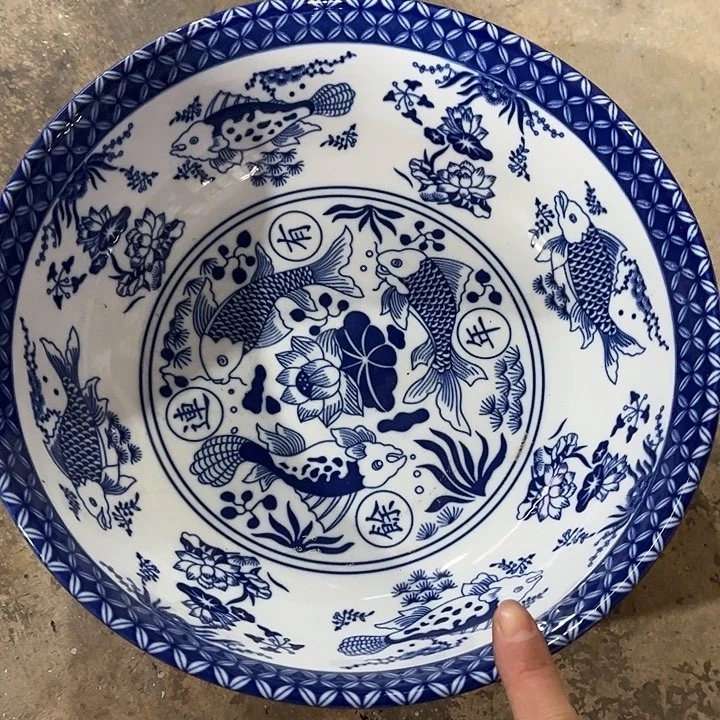 瓷片直径25厘米，高度8厘米……