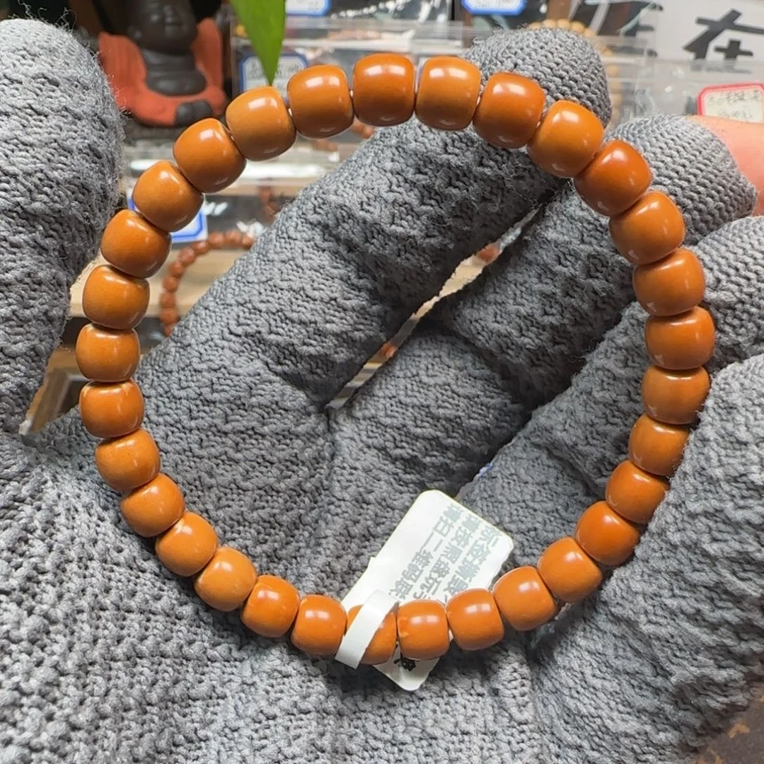橄榄核吊坠老挝7.5mm三花极限弧