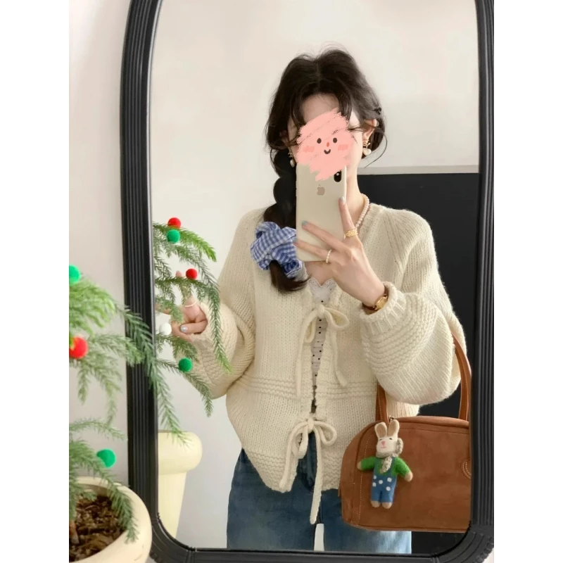 温柔风奶白色针织系带宽松罩衫女2025新款早秋季巨好看设计感上衣