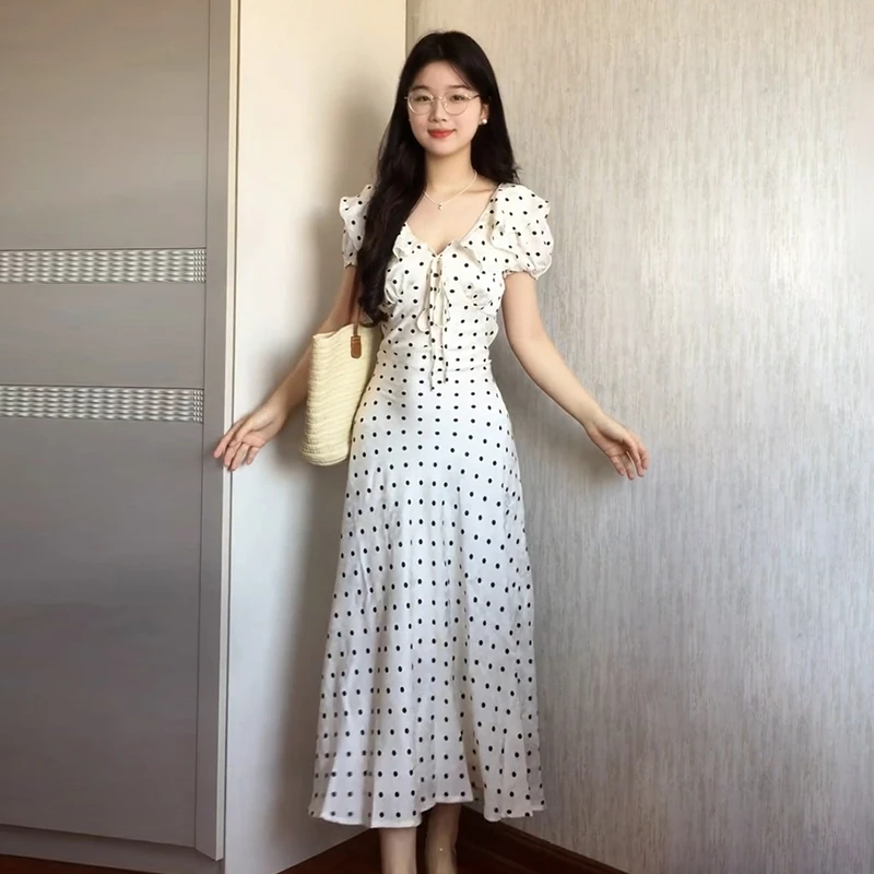 法式高级波点泡泡袖V领连衣裙子女夏季2025年新款气质收腰A字长裙