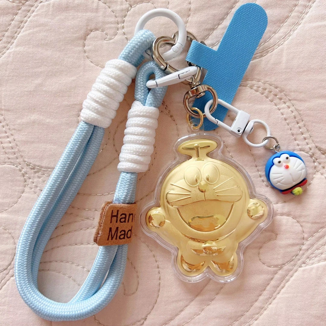 【新品热销】水贝黄金999 哆啦A梦 钥匙扣可爱卡通金片手机包挂件