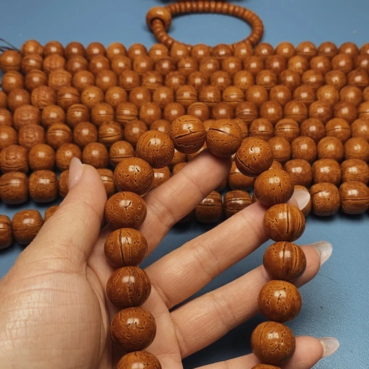 桃核手串极限圆16花皮色差开脐开裂15颗
