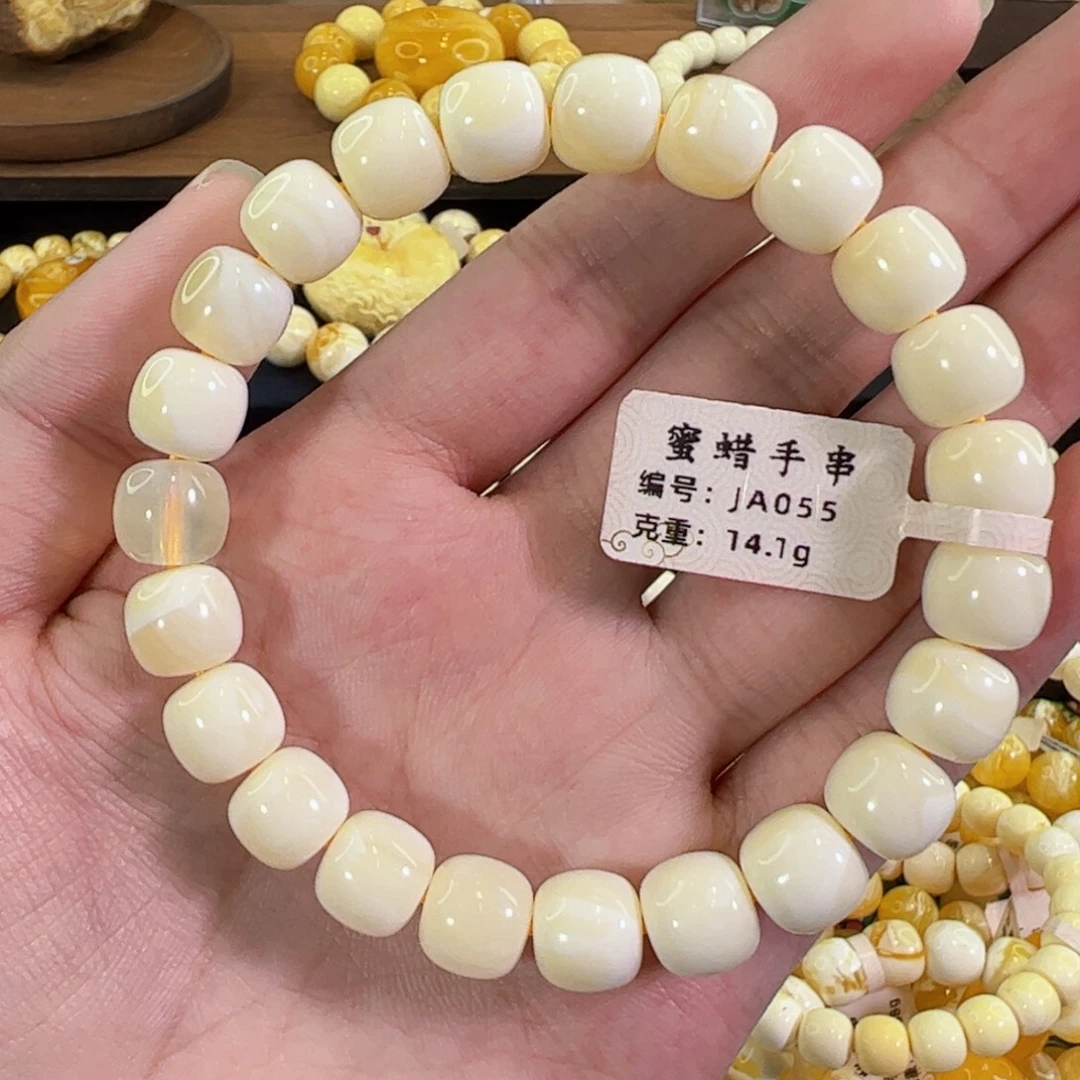 琥珀未镶嵌裸石10mm同料焦皮荧光拉丝老型手串