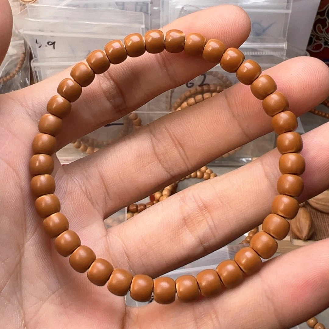 橄榄核吊坠老挝核尖单圈三花6.0mm