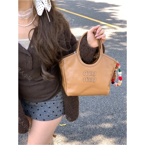 95新 MIU MIU/缪缪 缪缪棕色ivy手提斜挎包